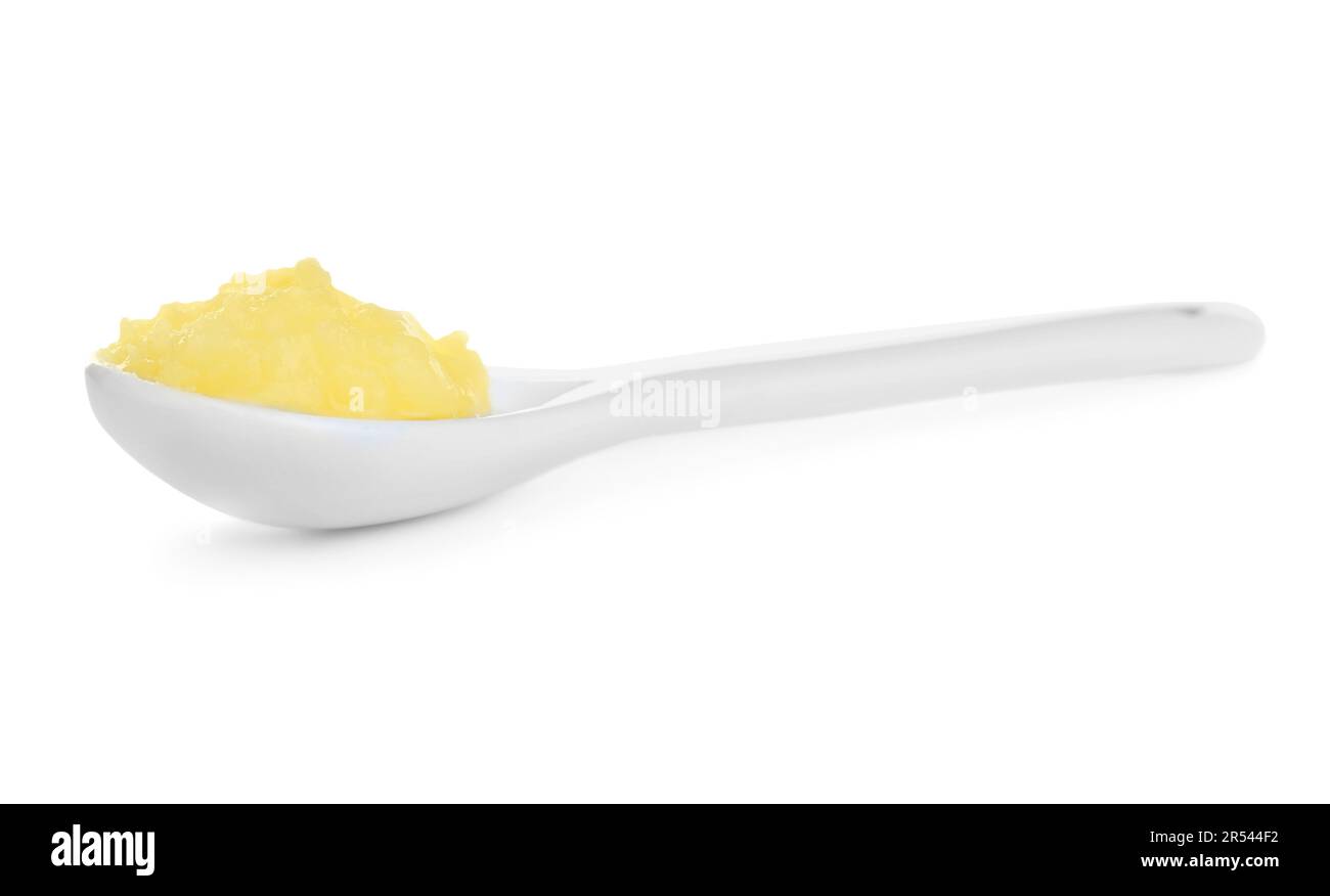 Spoon of Ghee butter isolated on white Stock Photo Alamy