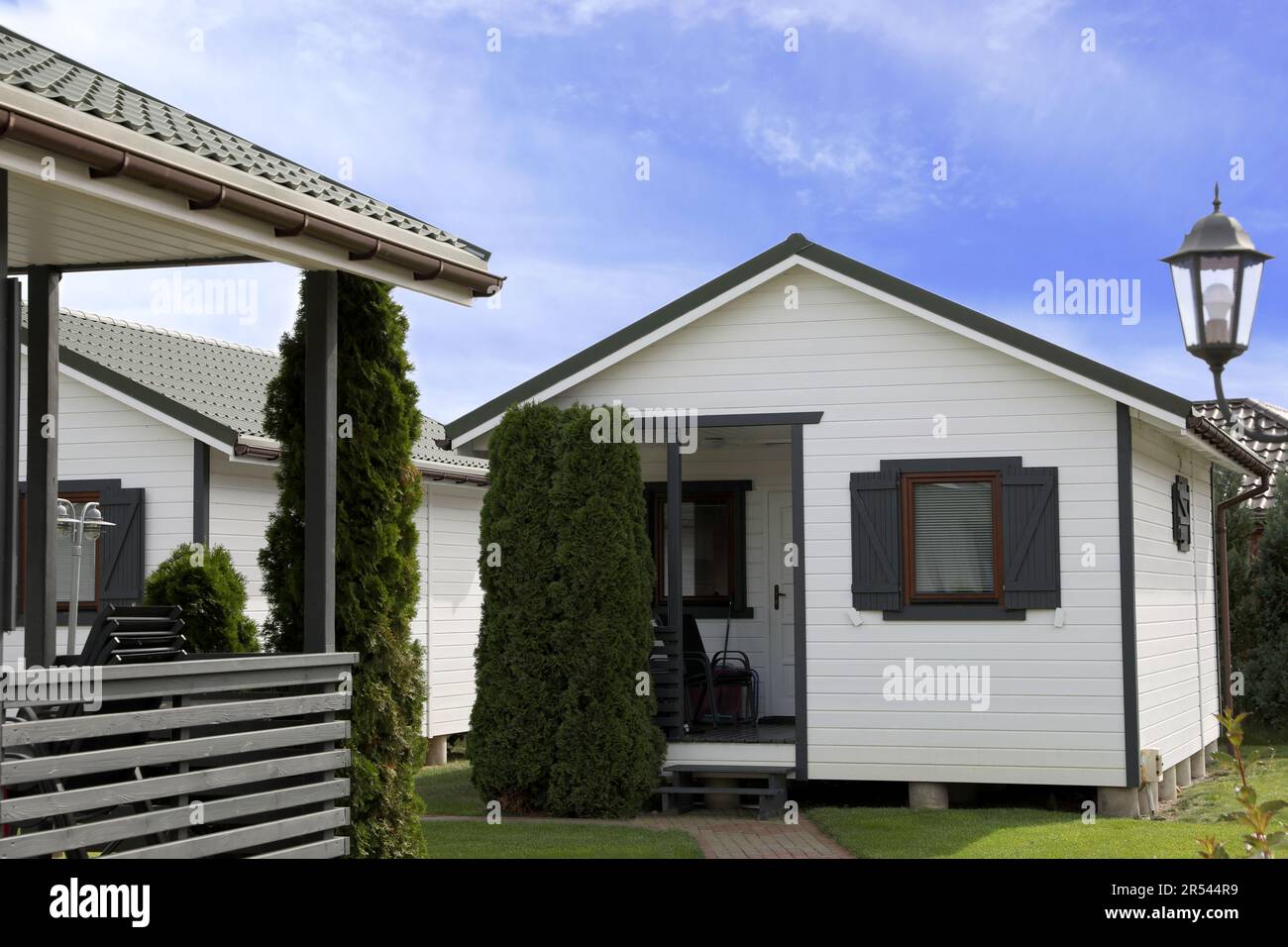 Beautiful modern white houses and plants outdoors Stock Photo Alamy