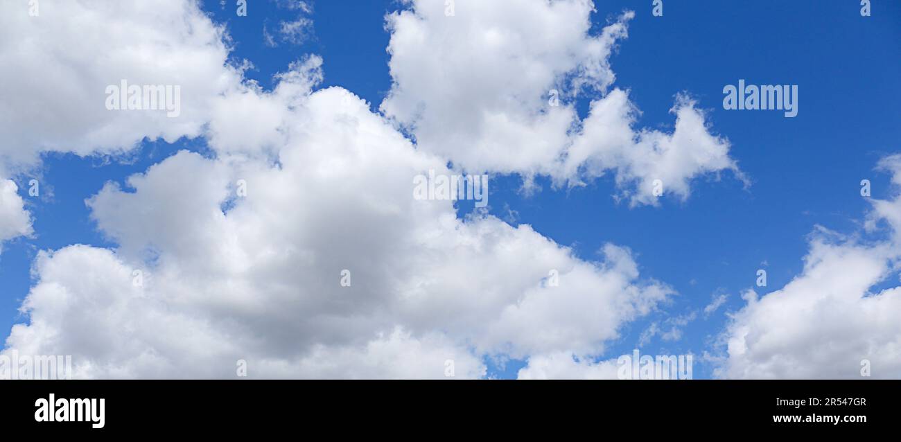 Picturesque view of beautiful blue sky with fluffy clouds on sunny day ...