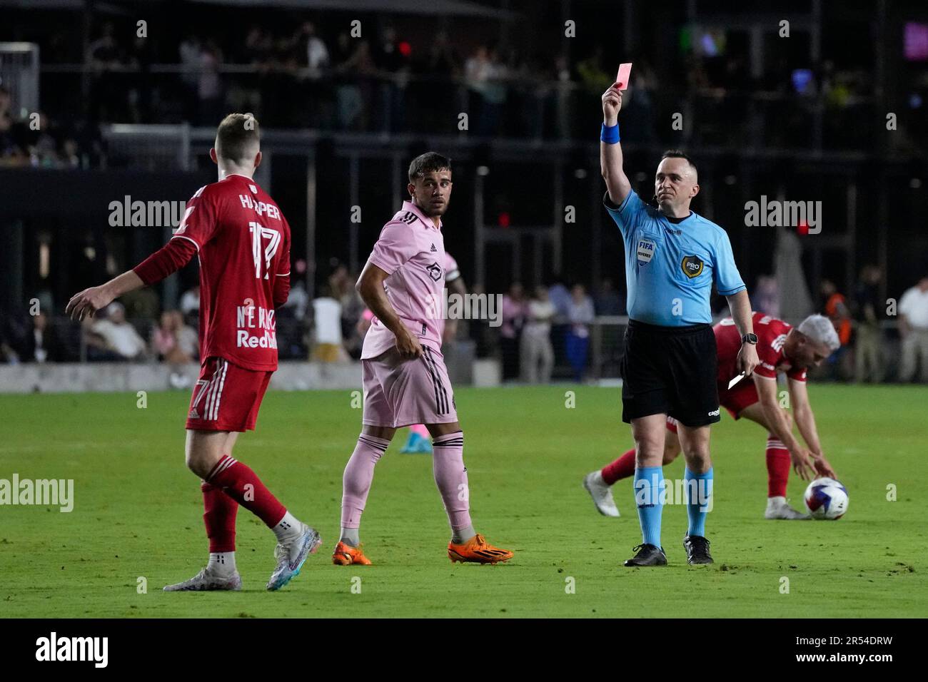 New York Red Bulls forward Cameron Harper (17) is shown a red card