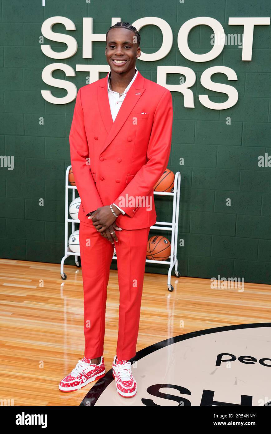 College basketball player Marquis 'Mookie' Cook,' who portrays LeBron James  in 'Shooting Stars,' poses at the premiere of the Peacock film, Wednesday,  May 31, 2023, at the Regency Village Theatre in Los