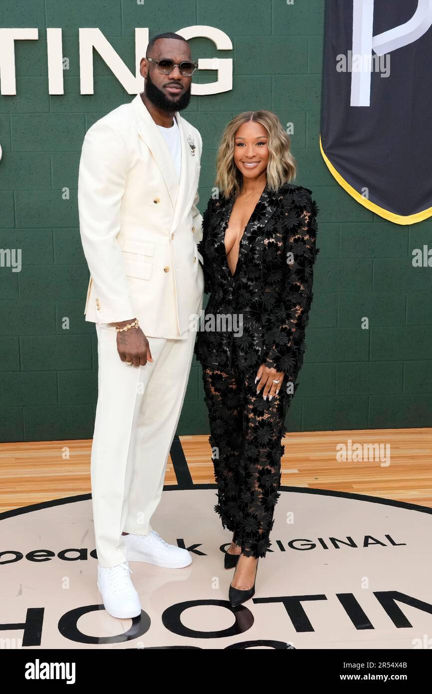 LeBron James and his wife Savannah pose together at the premiere of the ...