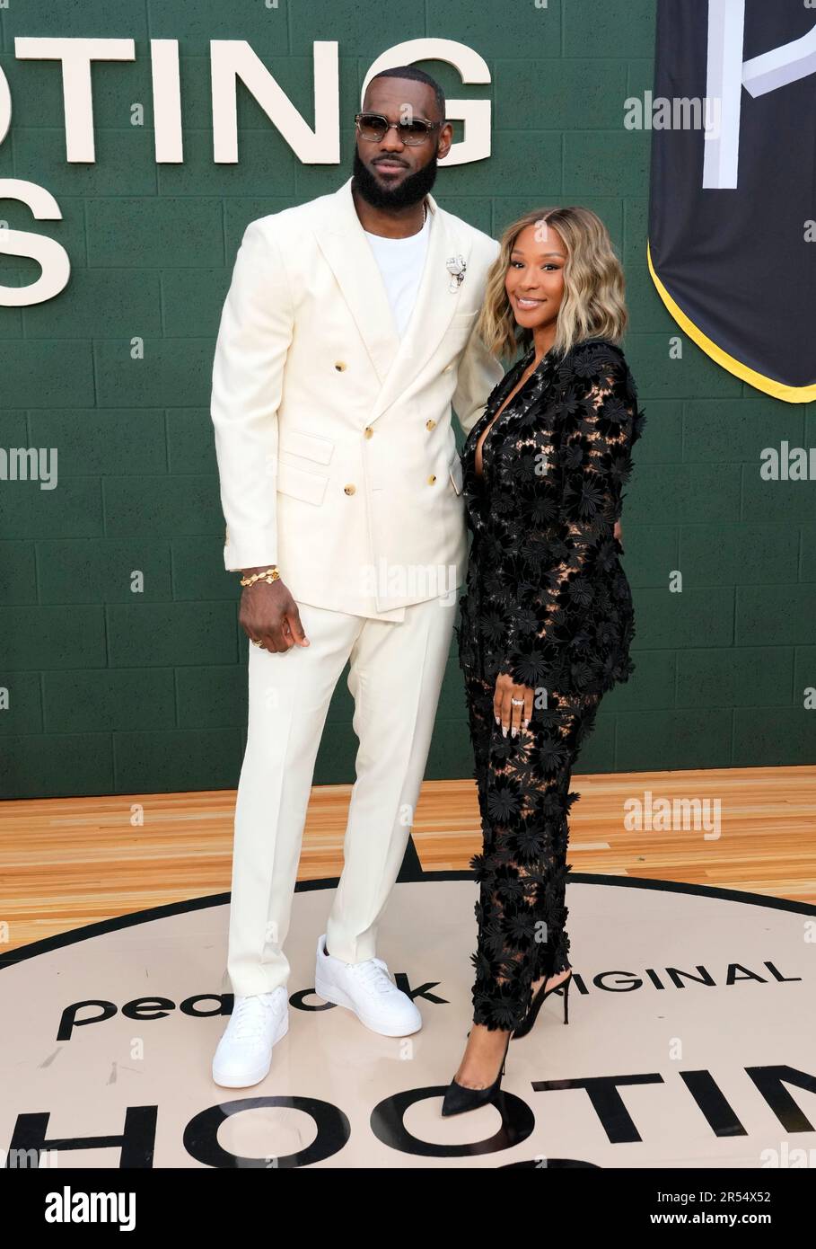 LeBron James and his wife Savannah pose together at the premiere of the ...