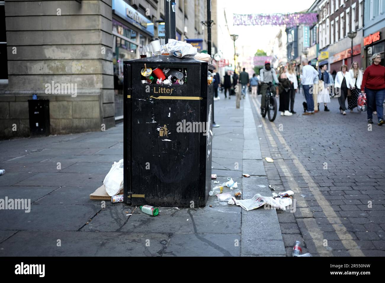 Bin overflowing with rubbish Liverpool city centre Stock Photo Alamy