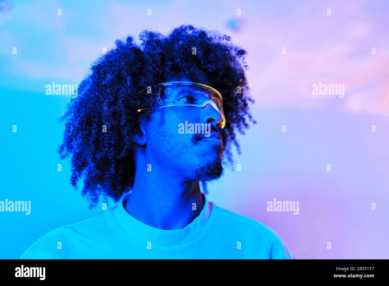 Man in glasses blue shirt hi-res stock photography and images - Alamy