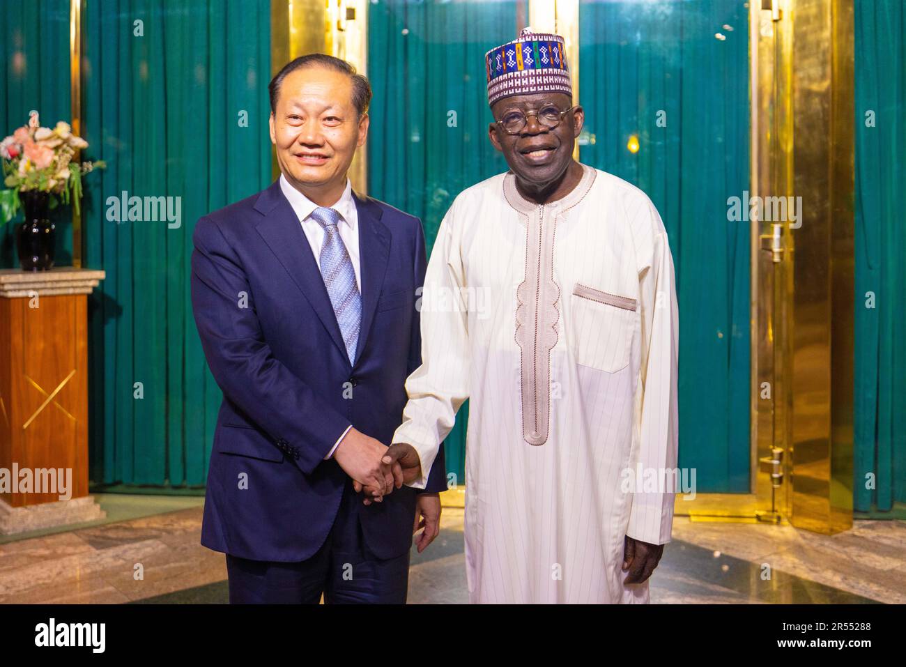 Abuja, Nigeria. 31st May, 2023. Nigerian President Bola Tinubu meets with Special Envoy of Chinese President Xi Jinping and Vice Chairman of the Standing Committee of the National People's Congress Peng Qinghua, in Abuja, Nigeria, on May 31, 2023. At the invitation of the government of the Federal Republic of Nigeria, Peng Qinghua attended Bola Tinubu's inauguration in Abuja on May 29. Credit: Nosa/Xinhua/Alamy Live News Stock Photo
