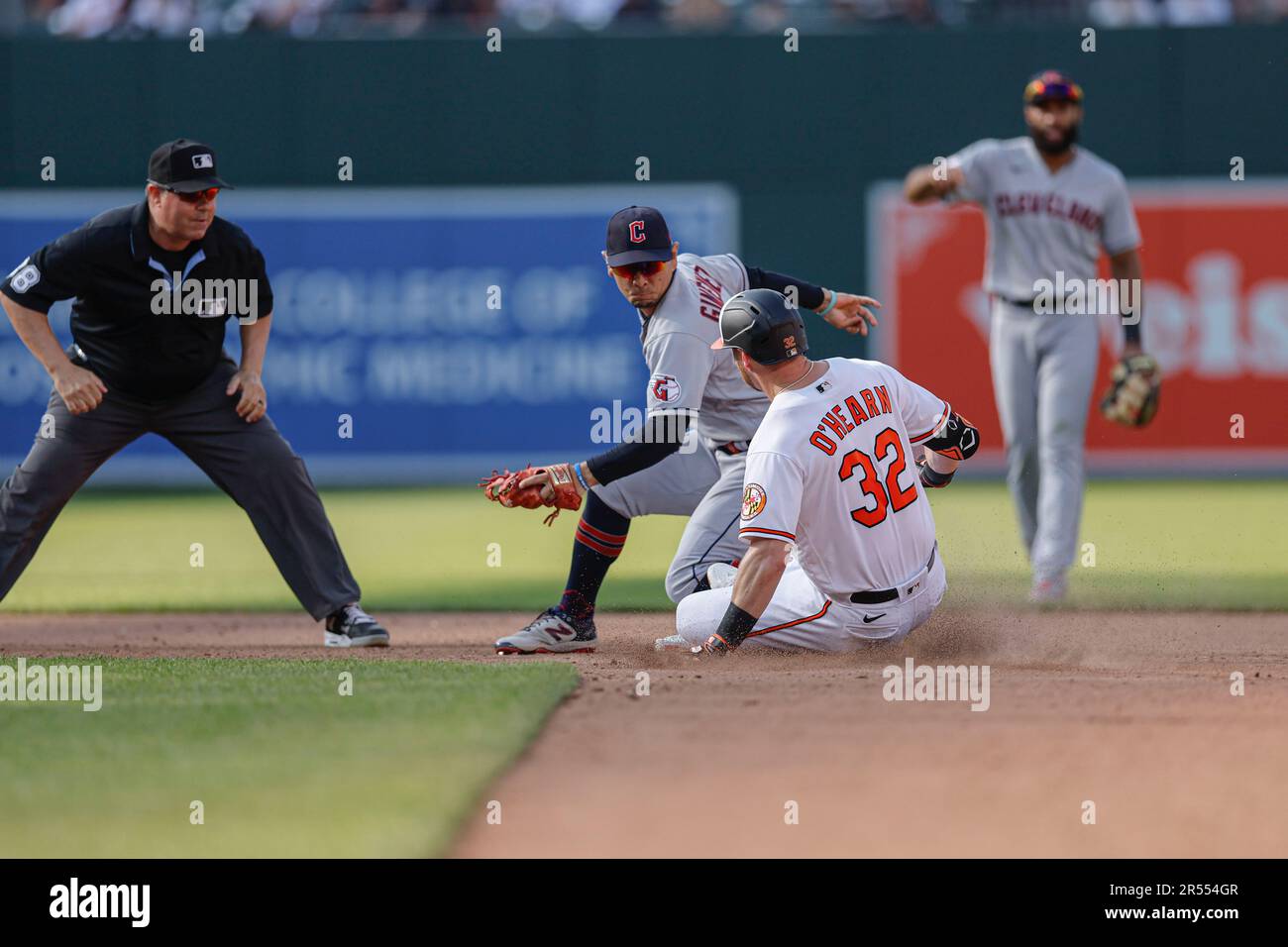 Baltimore, MD, USA; Baltimore Orioles first baseman Ryan O'Hearn (32) slides safely into second base before Cleveland Guardians second baseman Andres Stock Photo