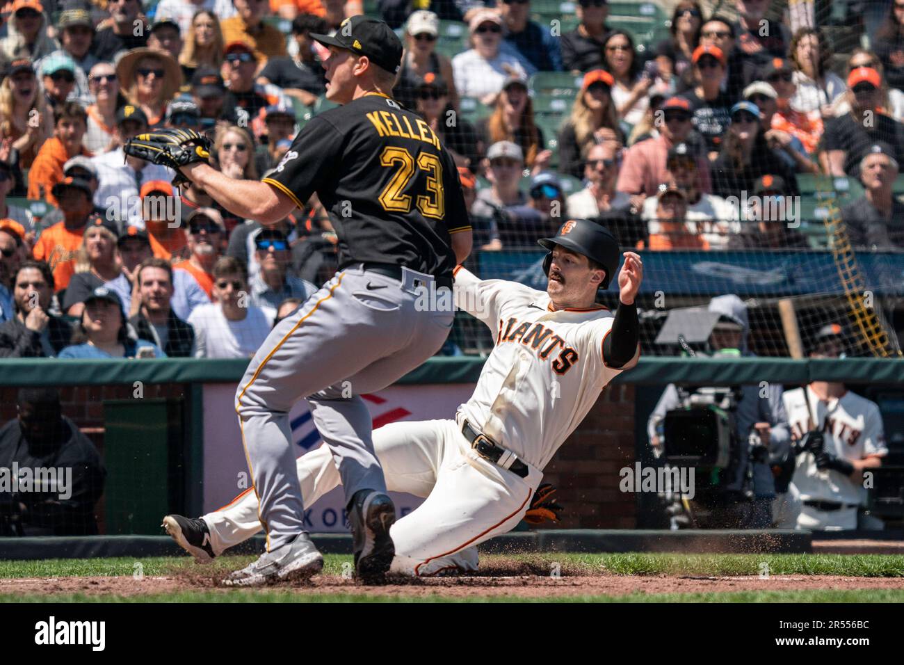 Pittsburgh Pirates starting pitcher Mitch Keller (23) covers home after throwing a wild pitch allowing San Francisco Giants center fielder Mike Yastrz Stock Photo