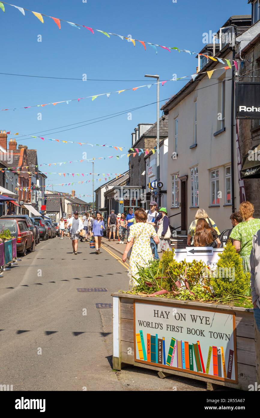 People enjoying  the 2023 Hay on Wye book festival in the glorious weather of summer sunshine in the Powys town of Hay on Wye Wales Stock Photo
