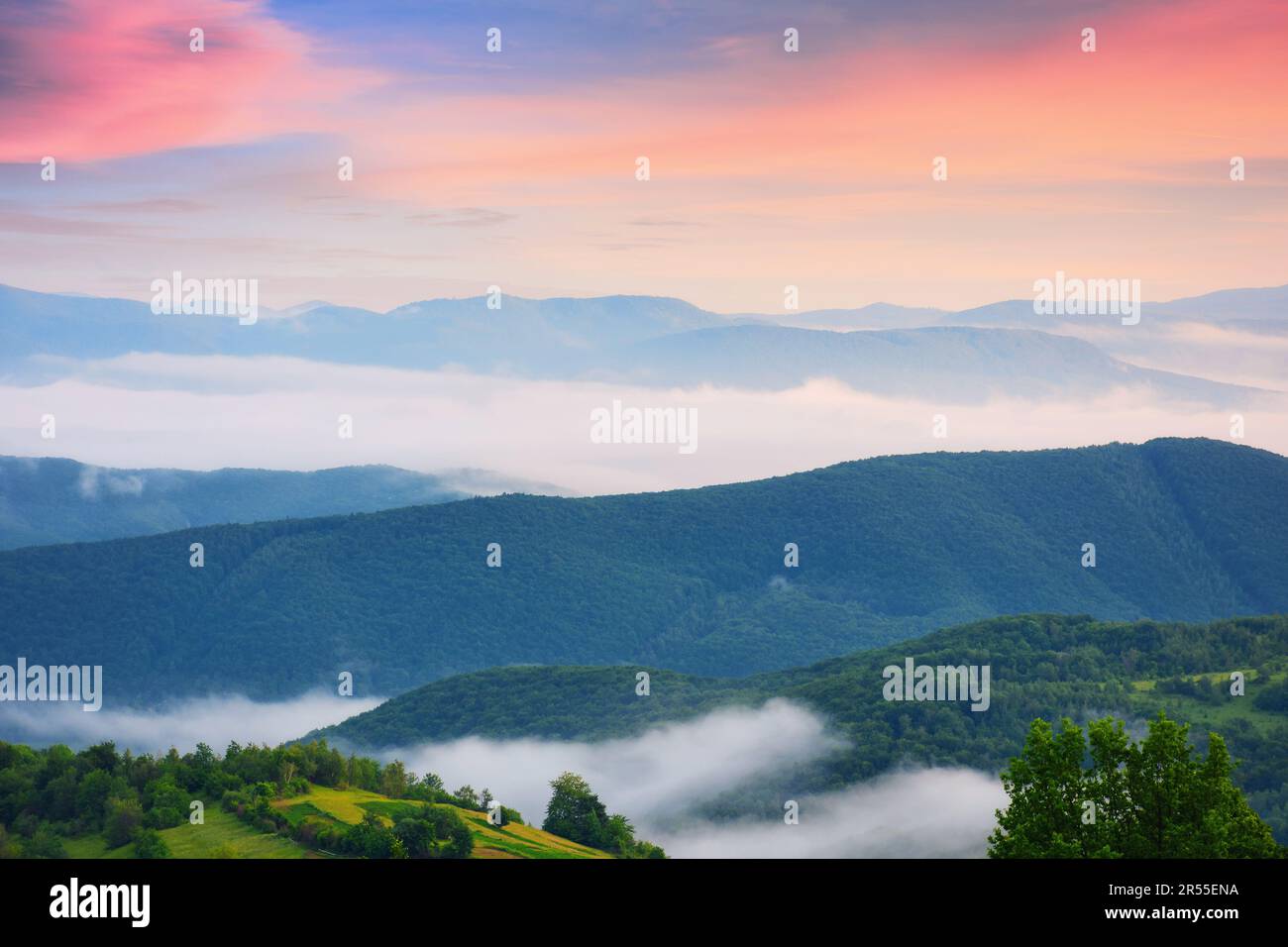 summer mountains on a cloudy sunrise. travel background Stock Photo