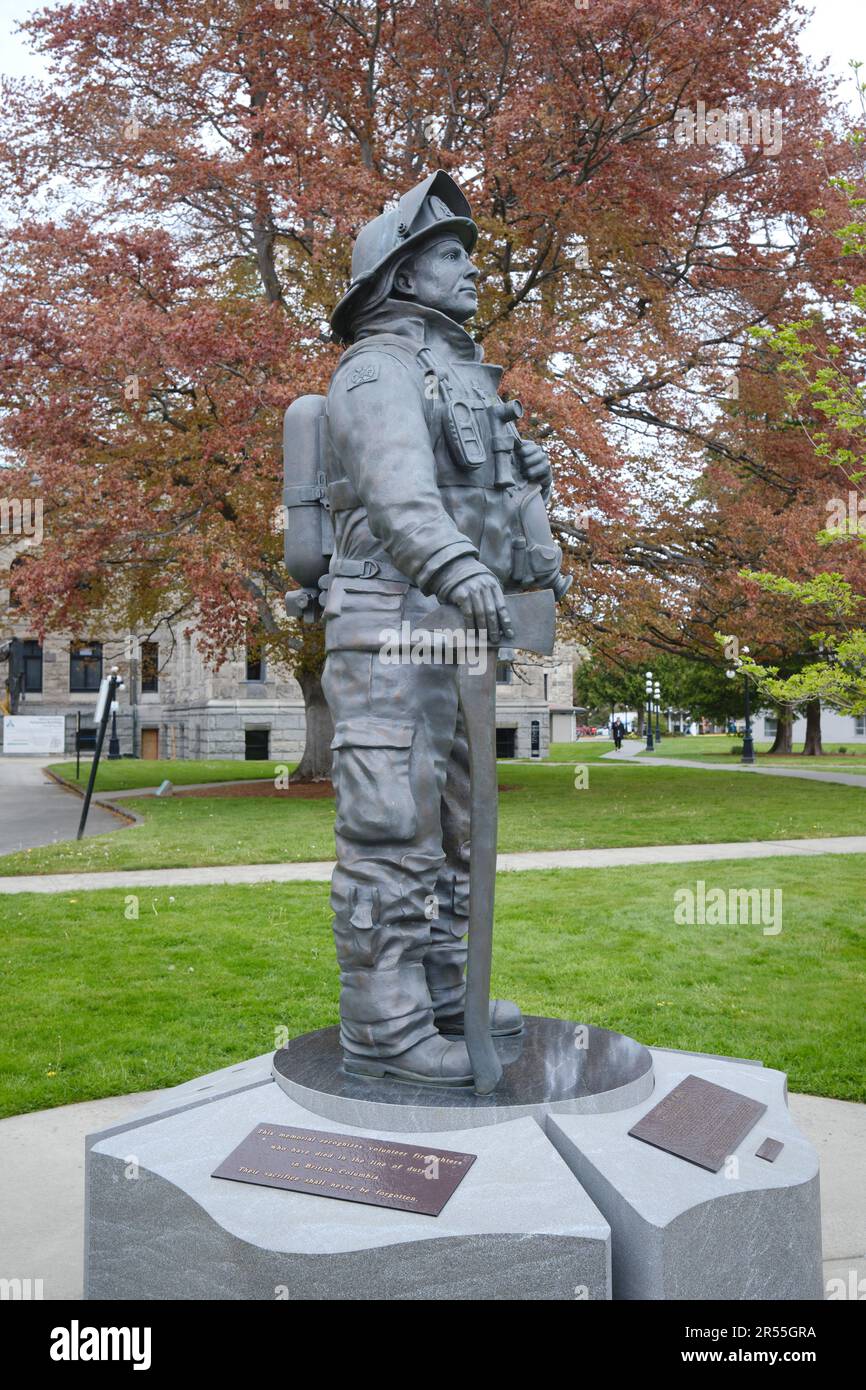 Statue of a firefighter in the Garden of Honour, BC Emergency Services, Victoria BC, Canada Stock Photo