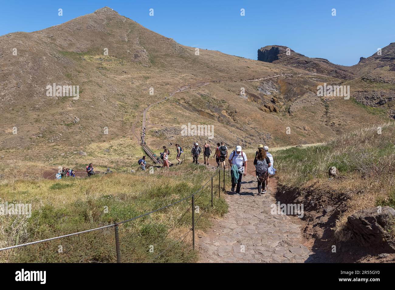 Madeira Island Portugal - 04 19 2023: Panoramic view of a group of tourists hiking in St. Lourenço Cape or Cabo de São Lourenço, on Madeira Island, Po Stock Photo