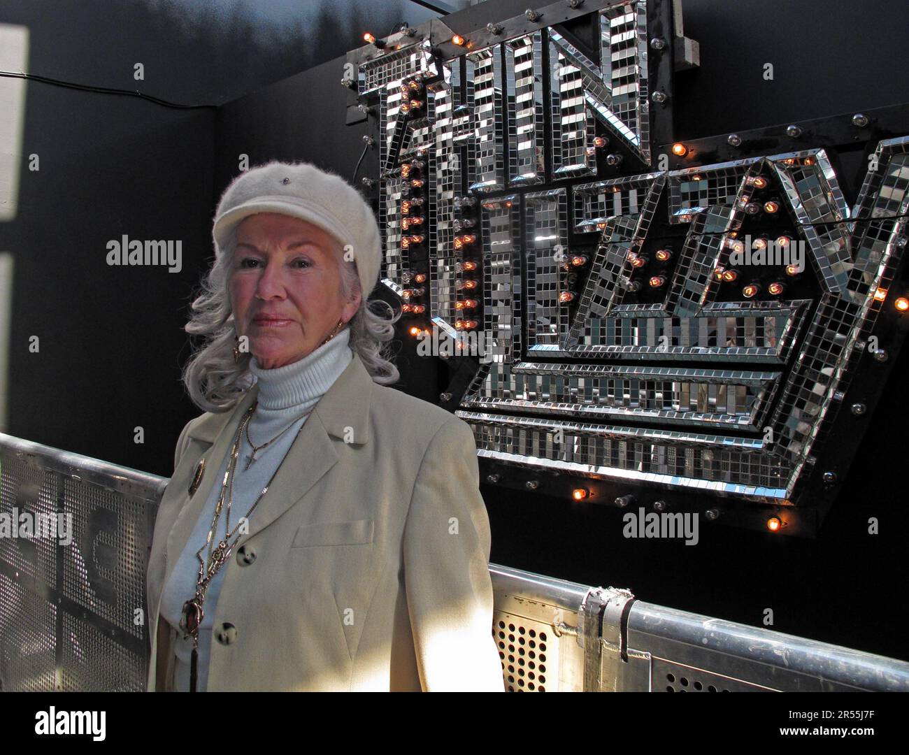 Philomena Lynott , from Crumlin, mother of Phil Lynott - Philip Parris Lynott, stands in front of the iconic Thin Lizzy lights, Dublin, Eire, Ireland Stock Photo