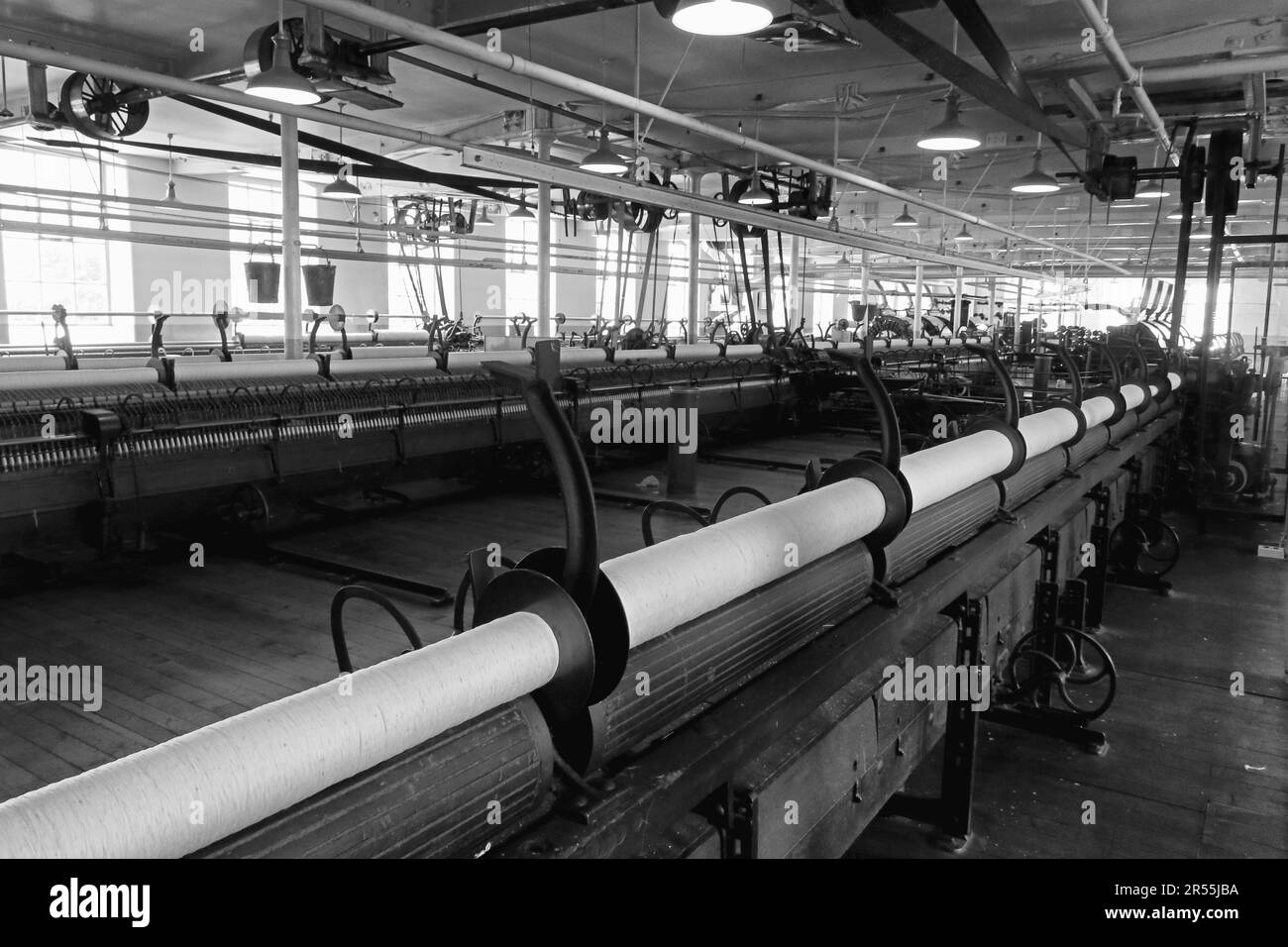 Power loom rows, as used in Lancashire weaving sheds and cotton factories during the late 19th and early 20th century Stock Photo