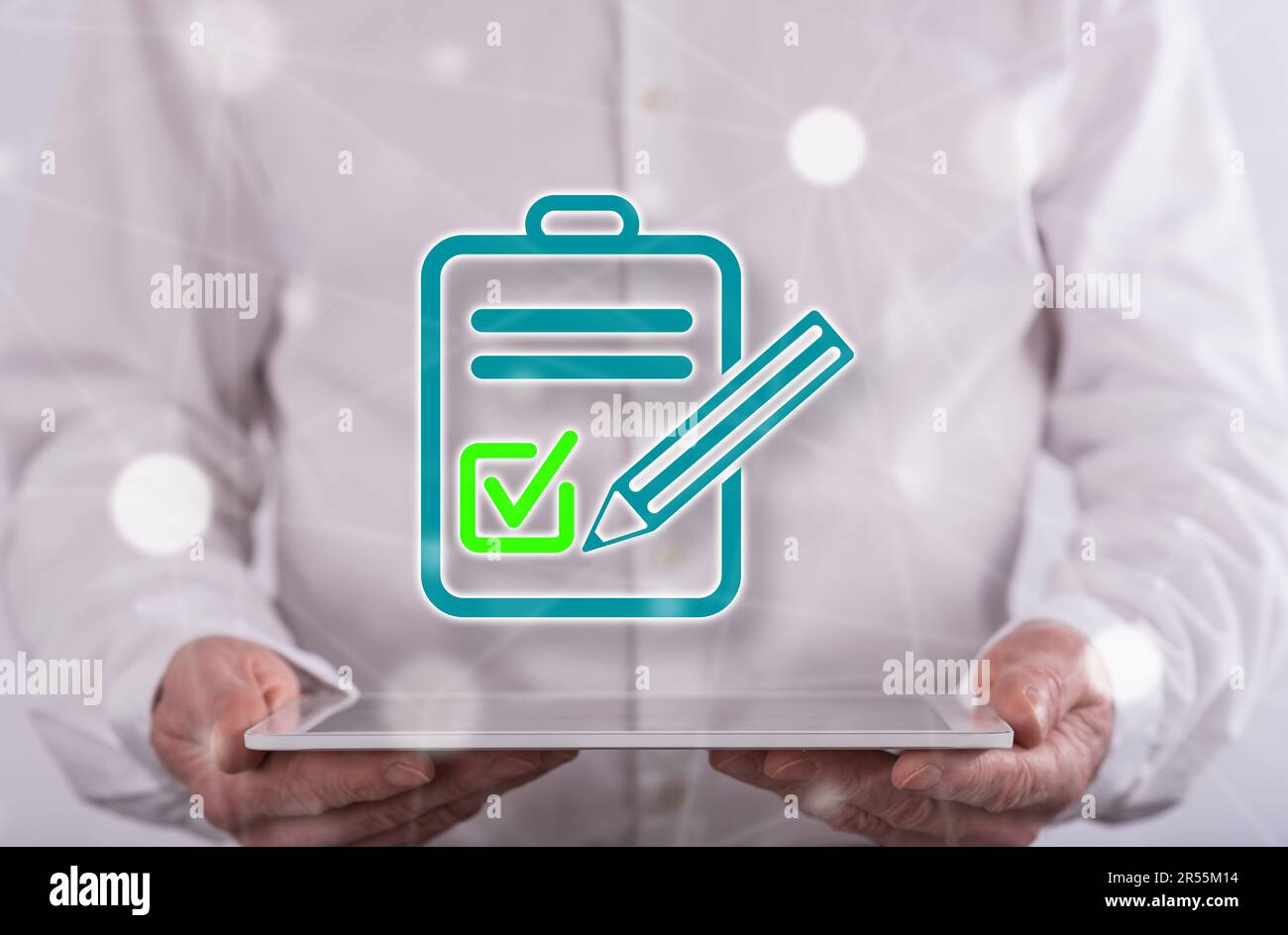 Document validation concept above a tablet held by a man in background Stock Photo