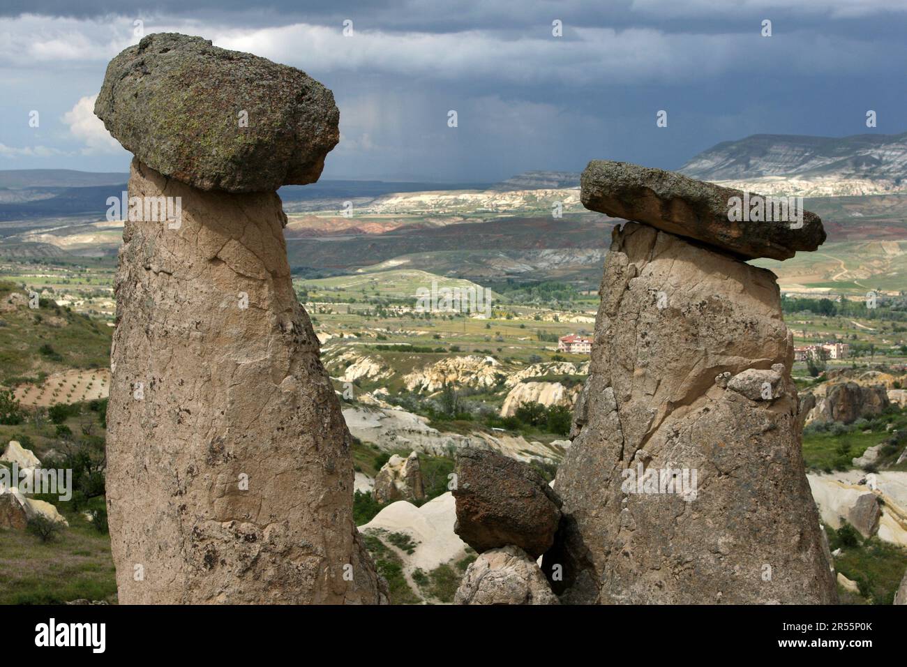 Unique volcanic rock formations known as fairy chimneys located at Urgup in the Cappadocia region of Turkiye. Stock Photo