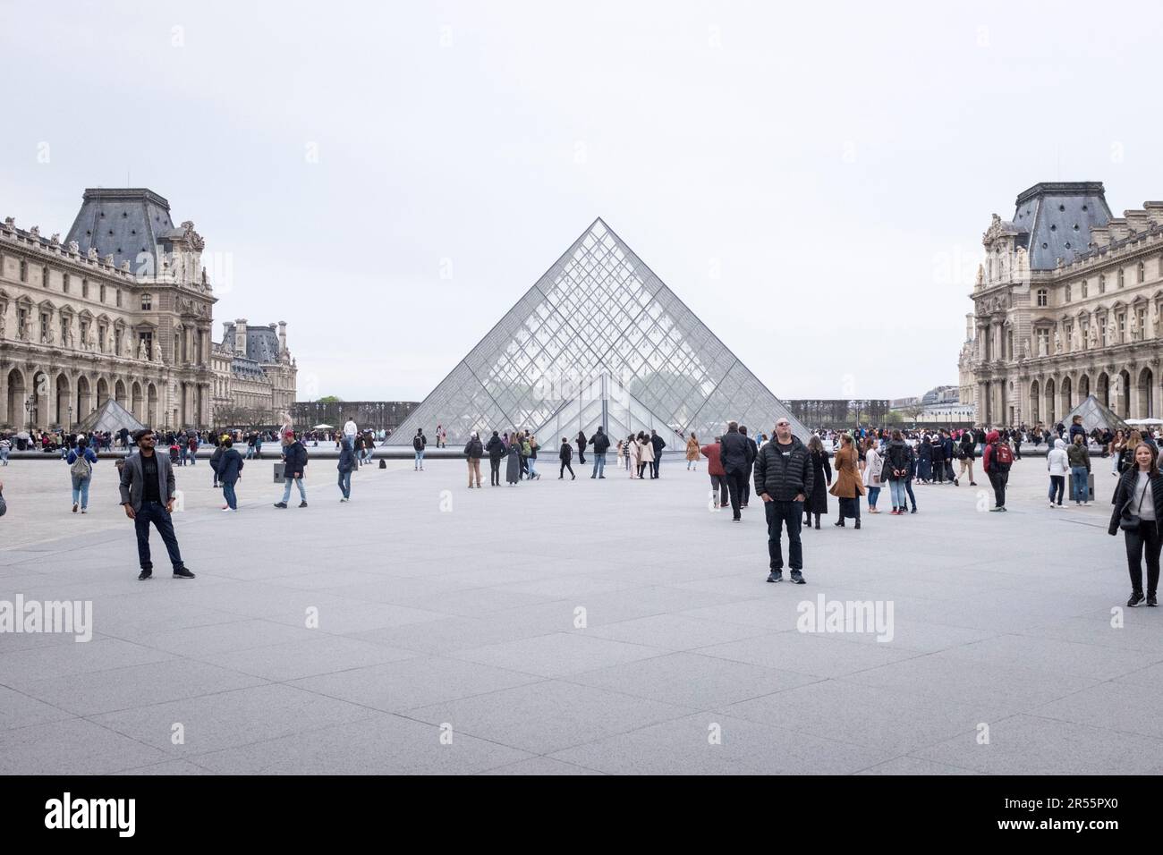 The iconic Louvre Pyramid and the elegant Palais Royale stand side by ...