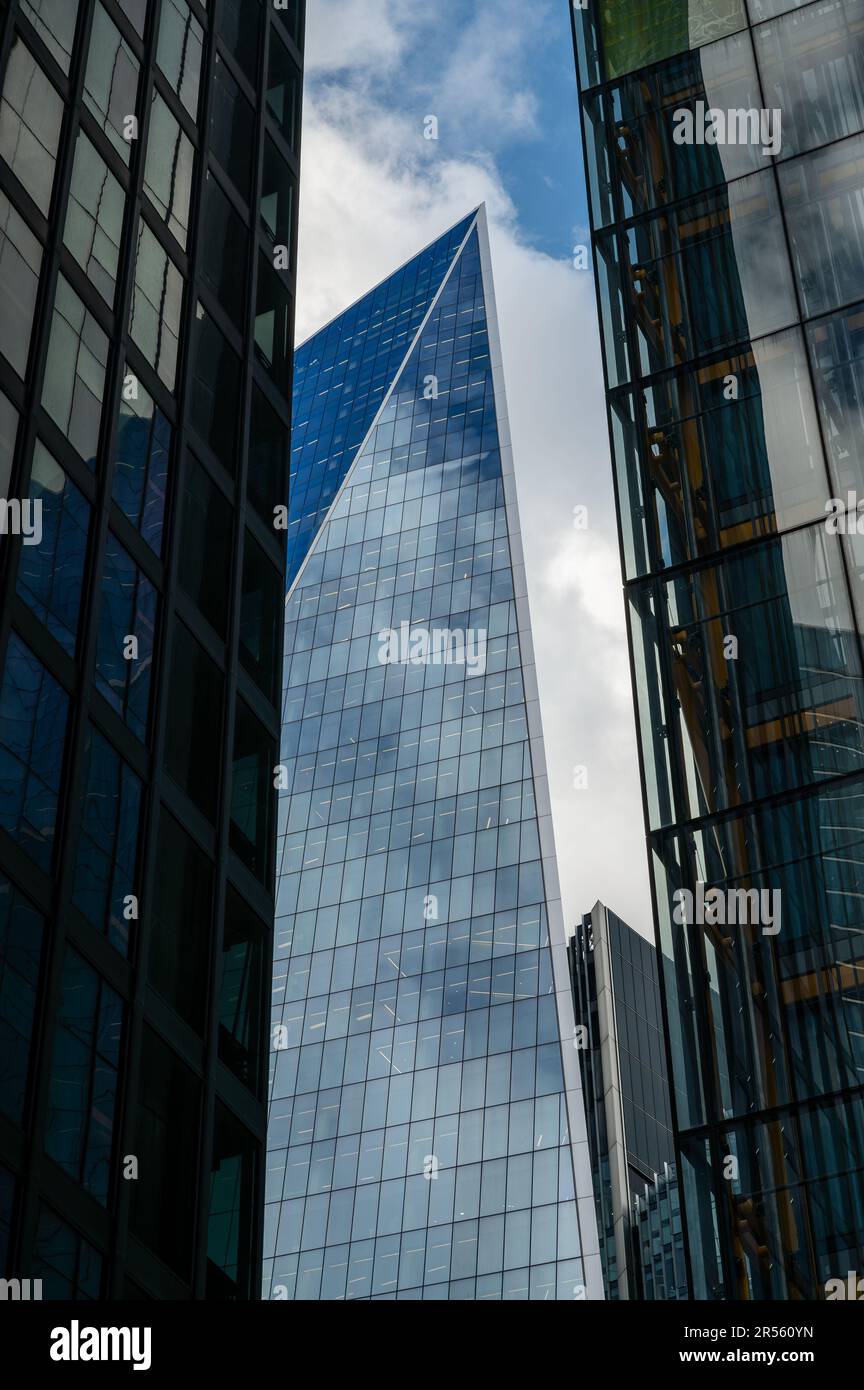 London, UK: The Scalpel at 52-54 Lime Street. This pointed London skyscraper is framed by other tall buildings, St Helen's (L) and The Cheesgrater (R) Stock Photo