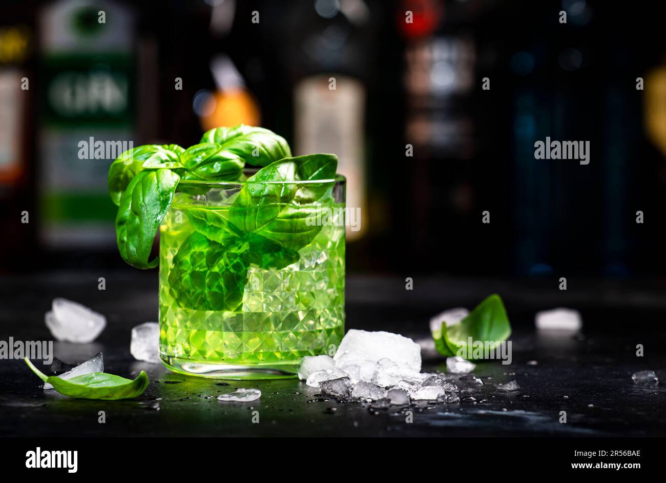 Basil smash alcoholic cocktail drink with dry gin, syrup, lemon, basil