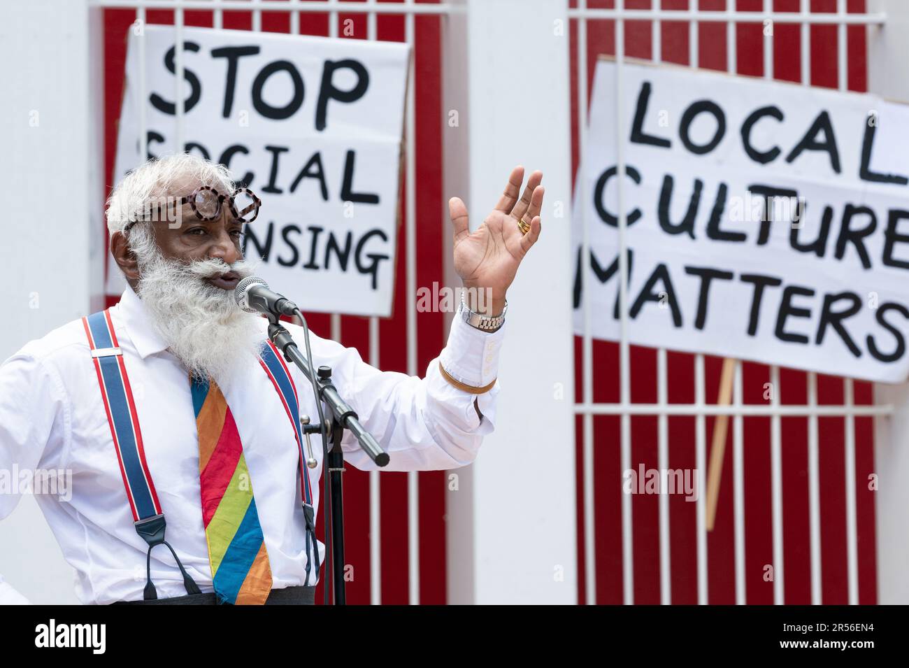 Writer and local resident Suresh Singh talks at a rally against plans to build shops and offices on the Truman Brewery site in Brick Lane, London. Stock Photo
