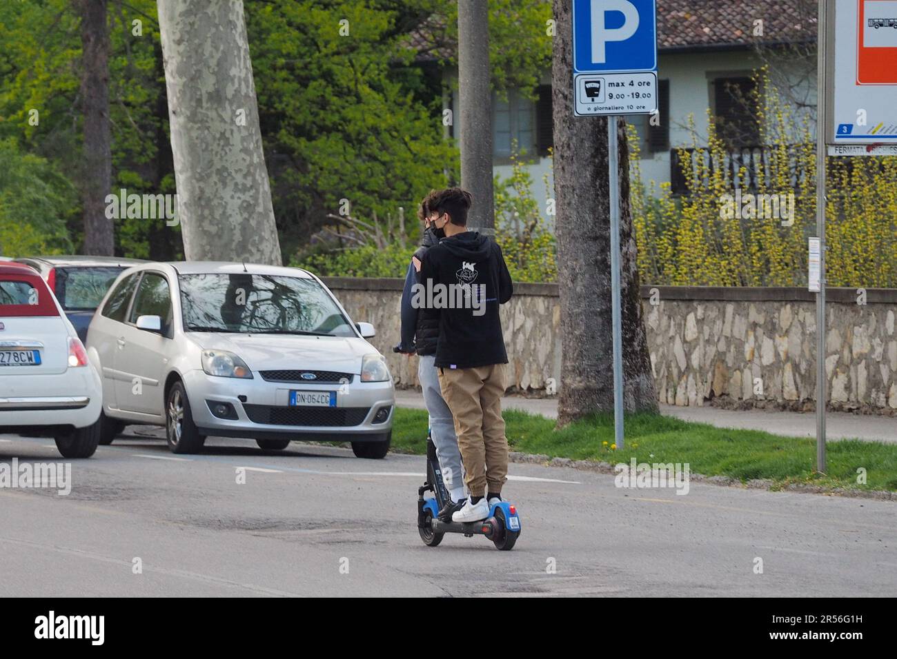 Bergamo, Italy. 01st June, 2023. 2023 for scooters despite increased controls and tougher penalties, many accidents still cause careless use. In 2 on the same vehicle, high speed on the sidewalks and with the cell phone in hand. Credit: Independent Photo Agency/Alamy Live News Stock Photo
