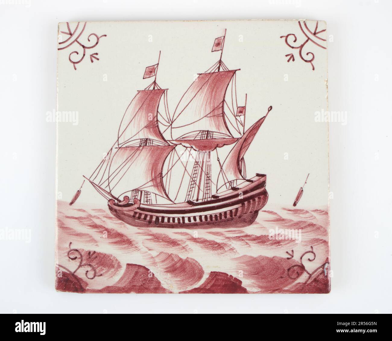 Antique 19th-early 20th century Delft manganese sailing ship pottery tile Stock Photo