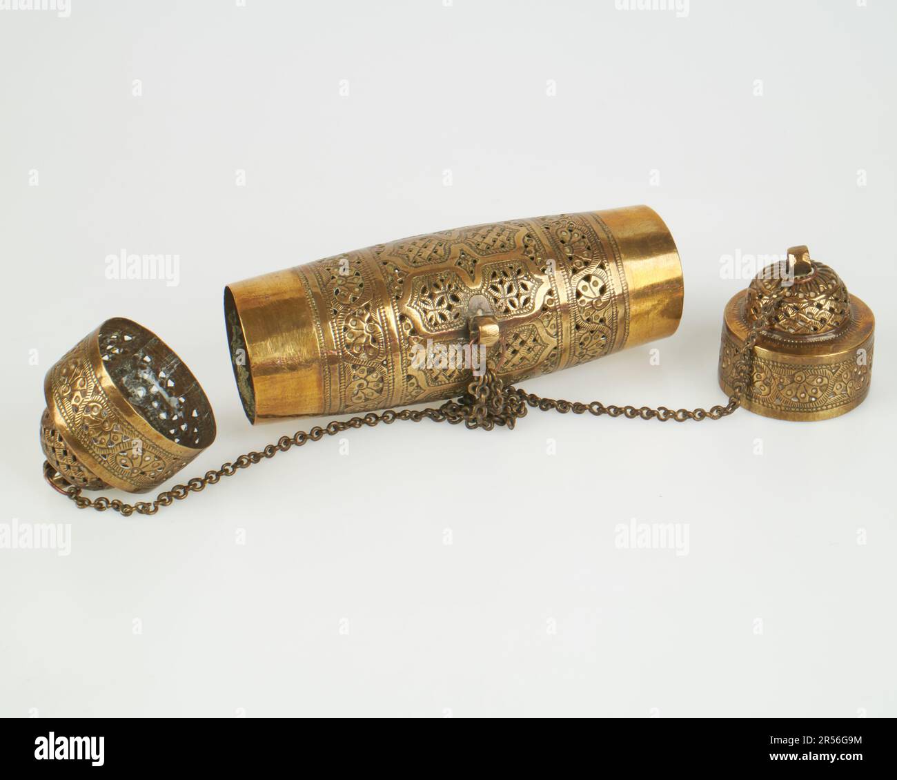 Antique 19thc brass double ended container rattle Stock Photo - Alamy