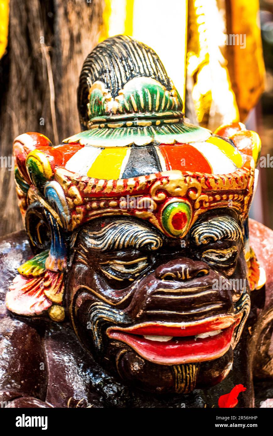 Balinese God statue in temple complex Taman Beji Griya Waterfall