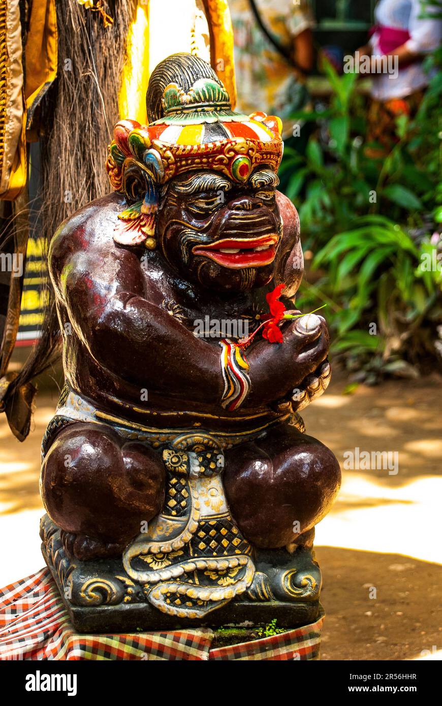 Balinese God statue in temple complex Taman Beji Griya Waterfall