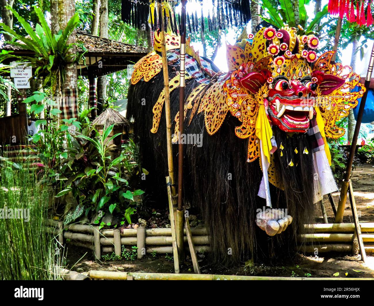 Balinese God statue in temple complex Taman Beji Griya Waterfall