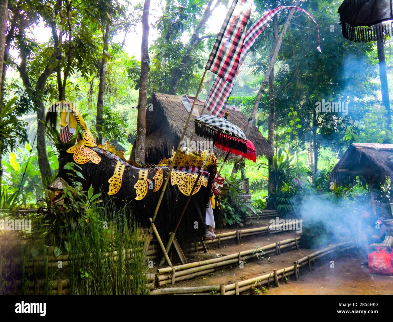 Balinese God statue in temple complex Taman Beji Griya Waterfall
