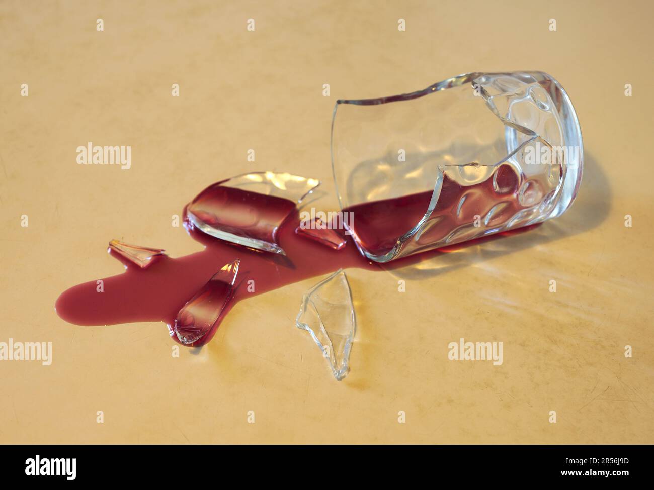 https://c8.alamy.com/comp/2R56J9D/broken-glass-with-spilled-red-wine-2R56J9D.jpg