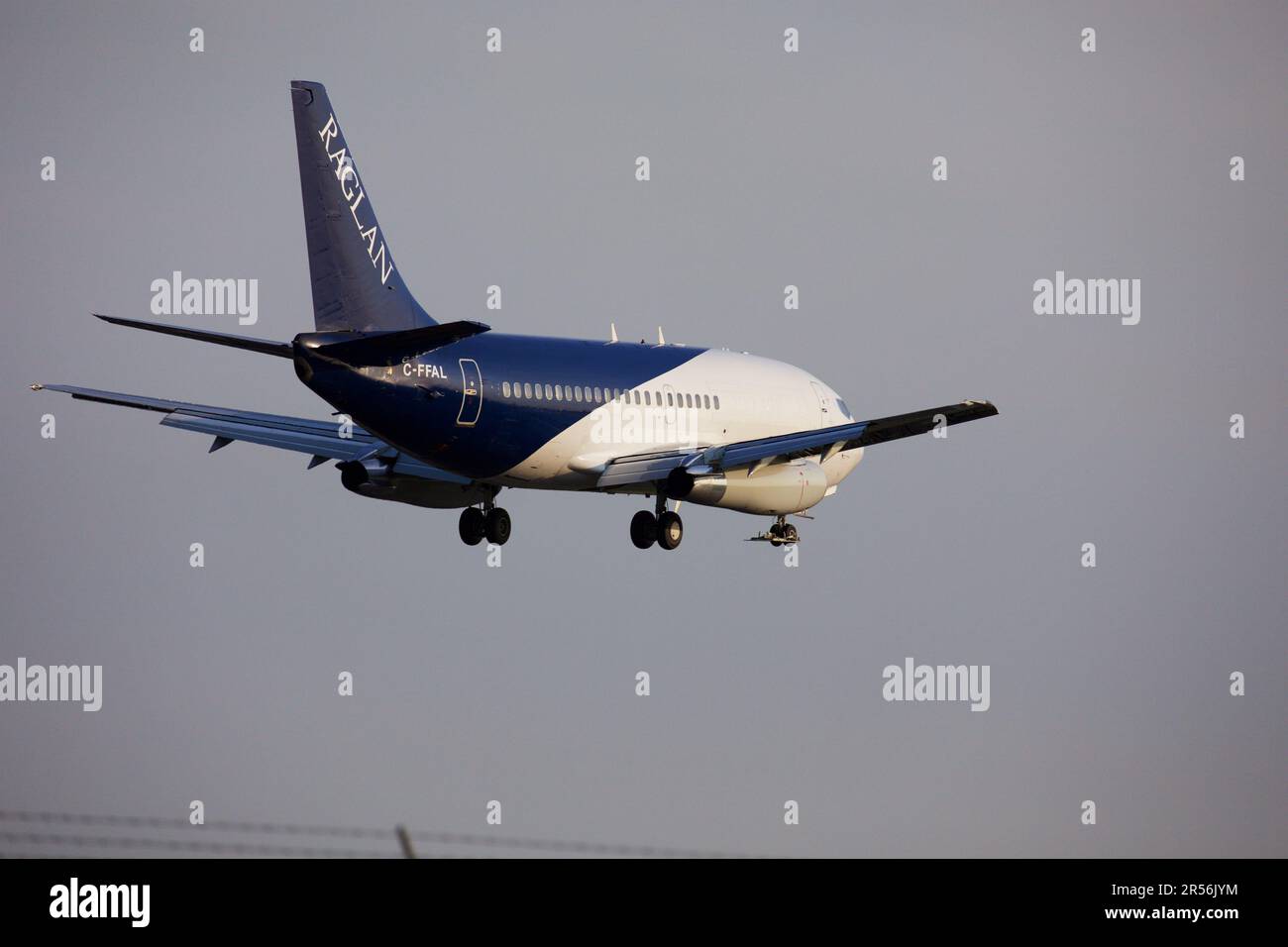 Raglan 737-200 Landing at Pearson Airport, Runway 23. Stock Photo