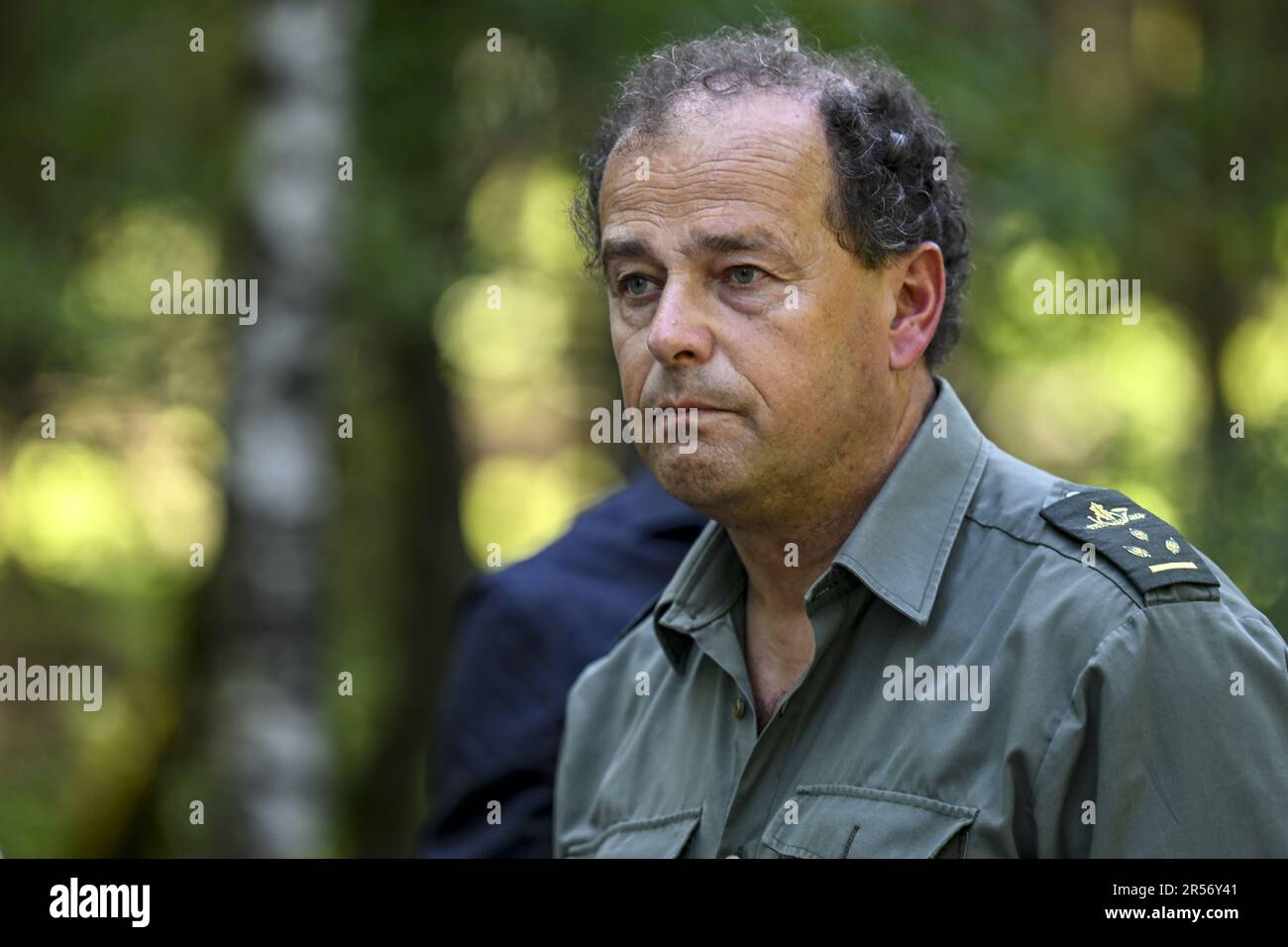 Eupen, Belgium. 01st June, 2023. Rene Dahmen, head of cantonment DNF Elsenborn pictured during a visit of Minister Tellier to the scene of a fire in the Hautes Fagnes between Ternell and Mutzenich, near the Belgian-German border, Thursday 01 June 2023. More than 170 hectares of vegetation have gone up in flames. The fire that was reportedly caused by humans started Monday evening. Belgian firefighters received assistance from German colleagues and civil protection. BELGA PHOTO DIRK WAEM Credit: Belga News Agency/Alamy Live News Stock Photo