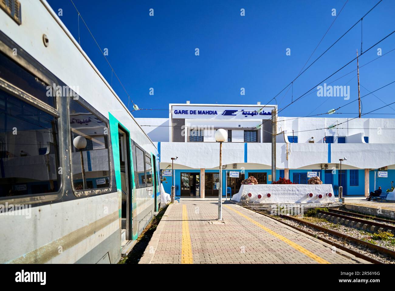 Mahdia, Tunisia, January 29, 2023: The platform of the Sahel Metro in Mahdia with the train waiting for passengers to Sousse Stock Photo