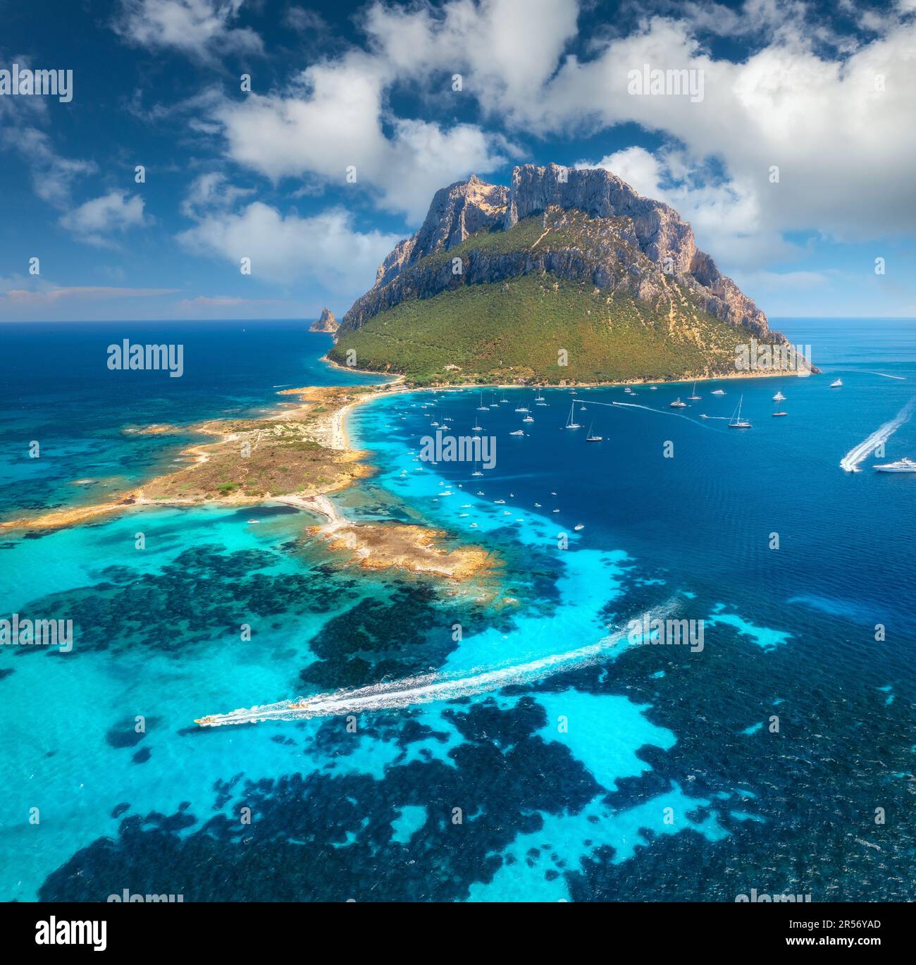 Aerial view of luxury yachts and floating speed boats on blue sea Stock ...