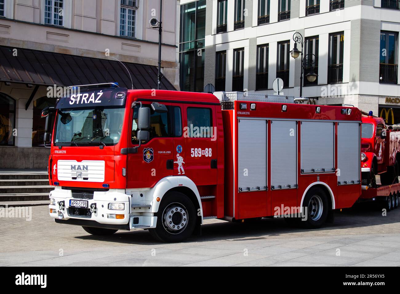 Warsaw, Poland - May 28, 2023 Fire engine driving in the city center of ...