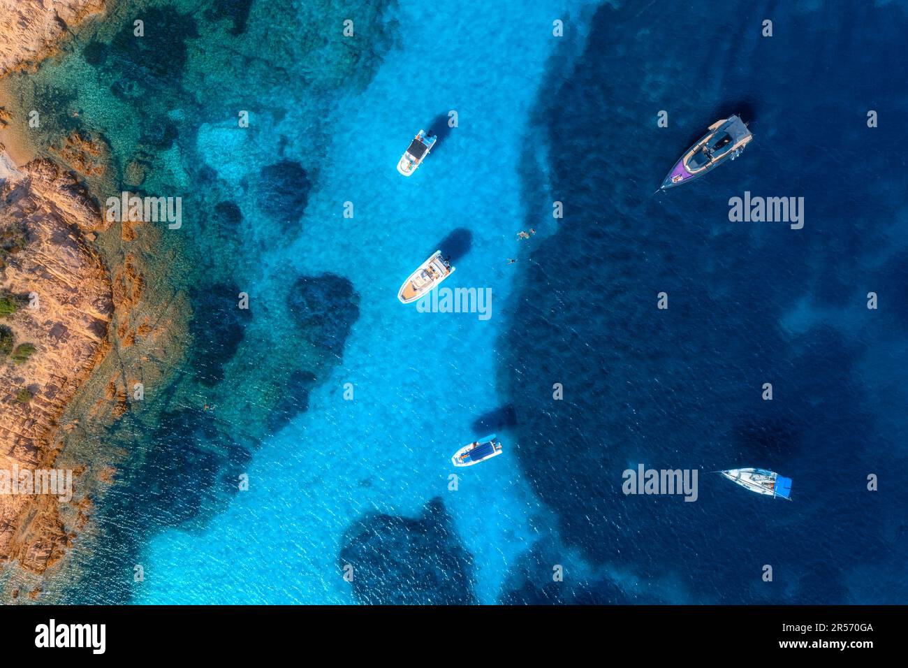 Aerial view of luxury yachts and boats on blue sea at sunny day Stock ...