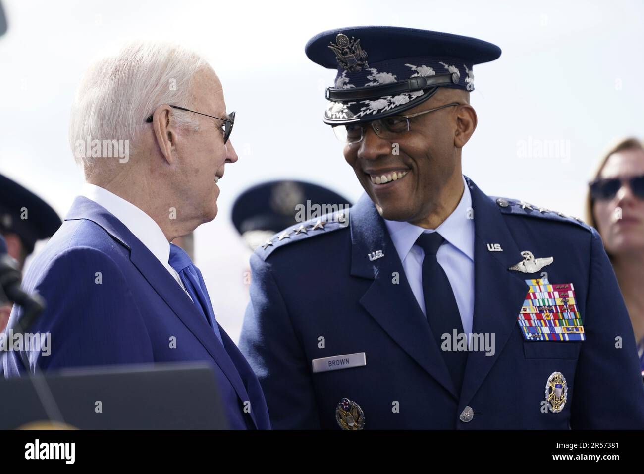 President Joe Biden speaks with Air Force Chief of Staff Gen. CQ Brown