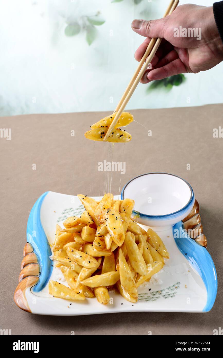 chinese food Chinese Yam in hot toffee(or candied Chinese Yam),Sugar