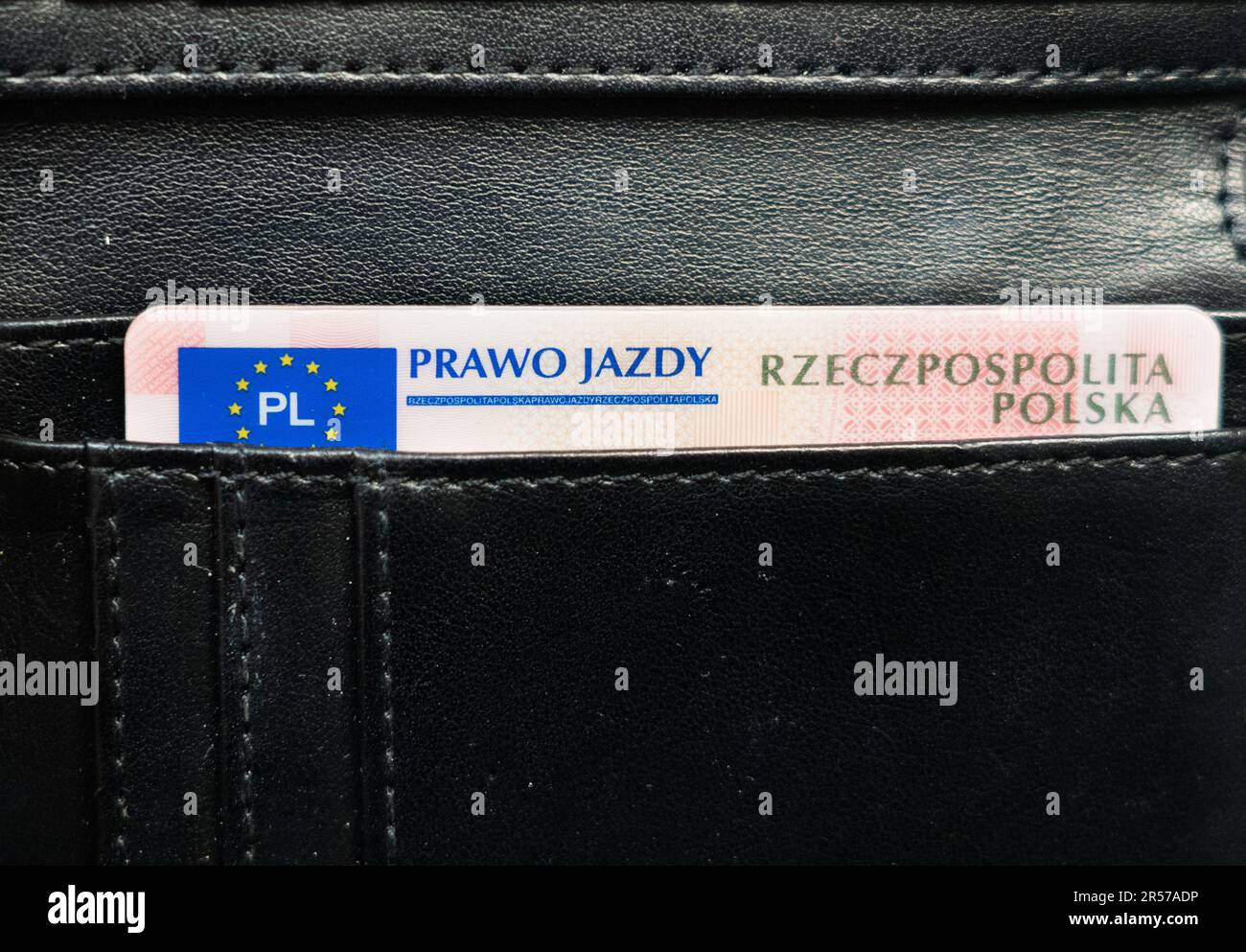 Prawo jazdy portfel, Polish driving license in a black wallet. Polish and european union emblem. Driver's license in Poland in a leather wallet Stock Photo