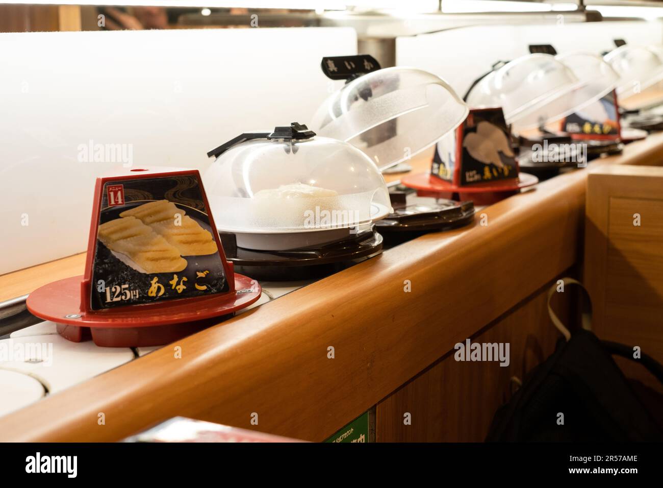 Conveyor belt sushi at Kura Sushi, Japan Stock Photo