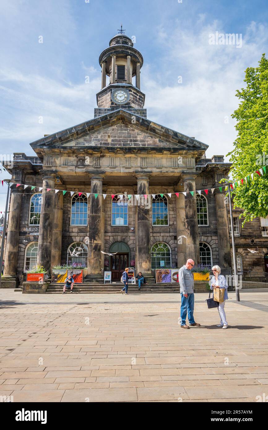 Customers and shoppers enjoying spring sun in the Lancaster city centre