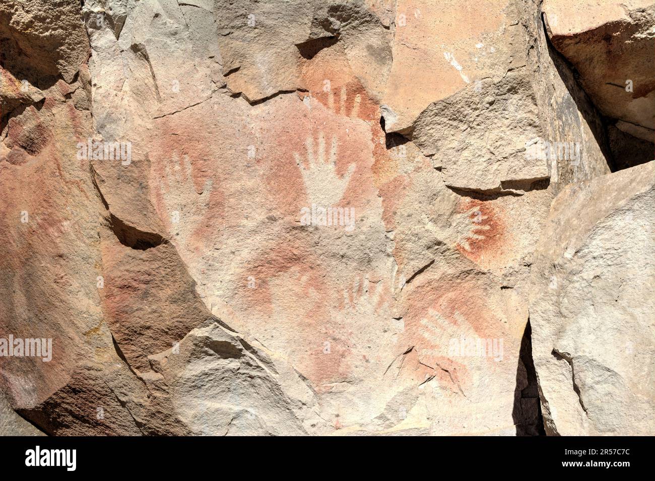 Prehistoric art - handprints in Cueva de las Manos cave and complex of rock art sites in Santa Cruz province, Argentina Stock Photo