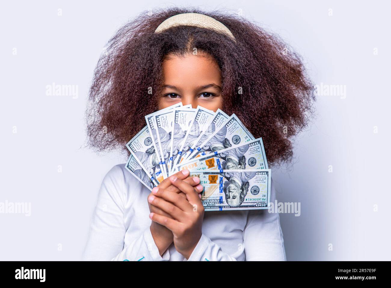 Premium Photo  Woman smiling with white teeth and holding lots of money in  dollar currency