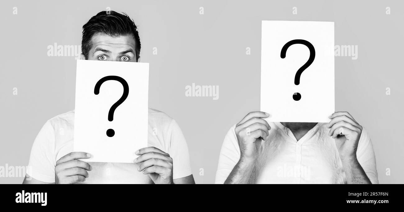 Anonymous man, peeking behind of interrogation symbol. Male incognita ...