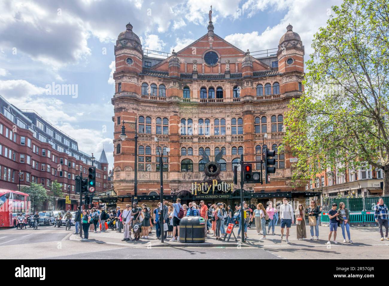 People outside The Palace Theatre, Cambridge Circus, London. At the