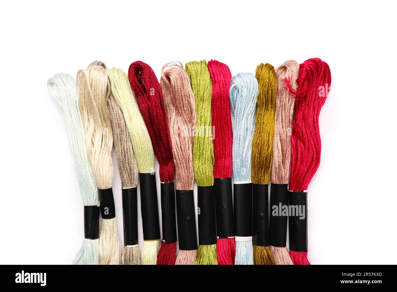 Different mouline threads isolated on white background Stock Photo - Alamy