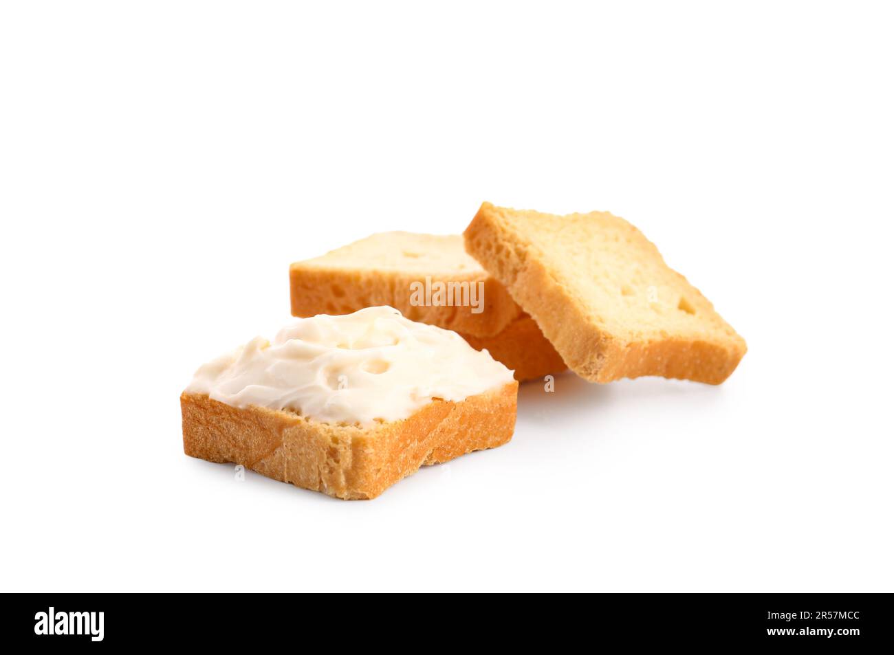 Tasty croutons with cream cheese on white background Stock Photo - Alamy