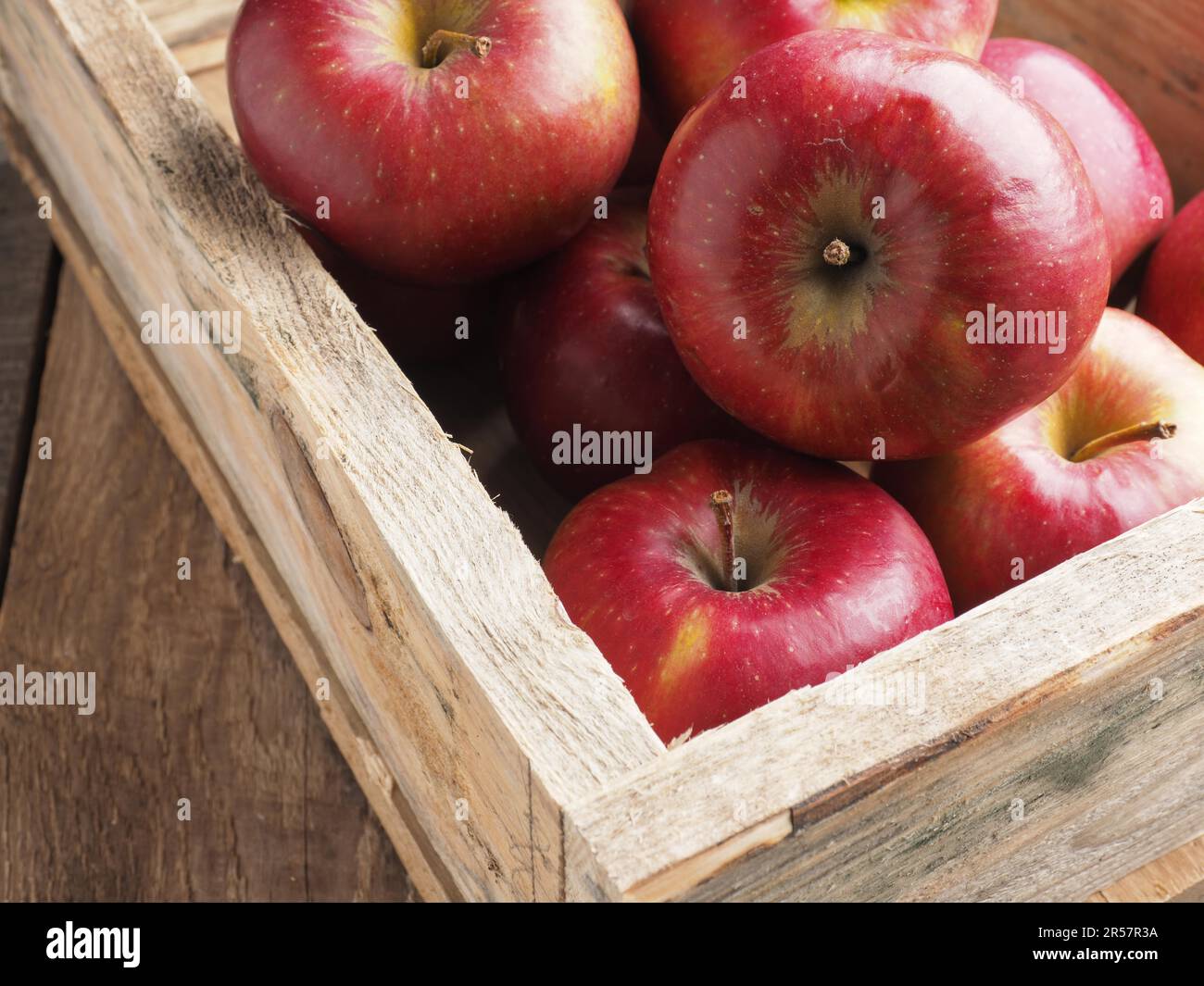 Fresh red organic apples in a wooden box after harvesting, seasonal food,  agriculture concept Stock Photo - Alamy